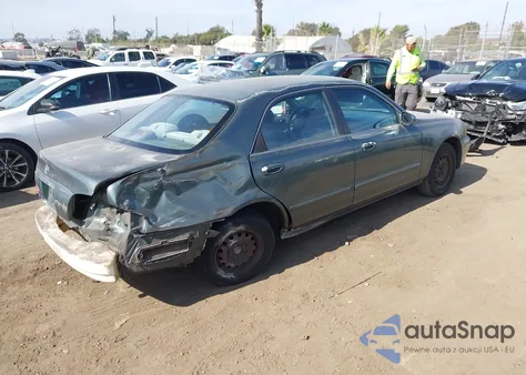 1998 Mazda 626 Dx/Lx from USA, damaged, VIN 1YVGF22C2W5691764